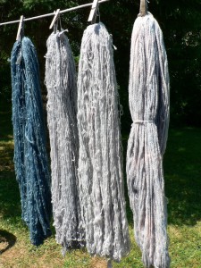 three pale woad skeins and a decent one